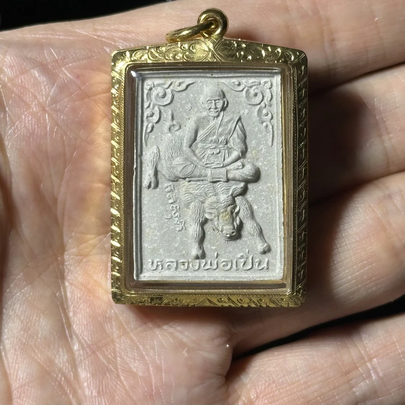 Luang Pho Pern · Seated Boar · Powder · 70th Birthday Ed. · Wat Bang Phra B.E. 2534 — Gold Tube + Gem Inlay